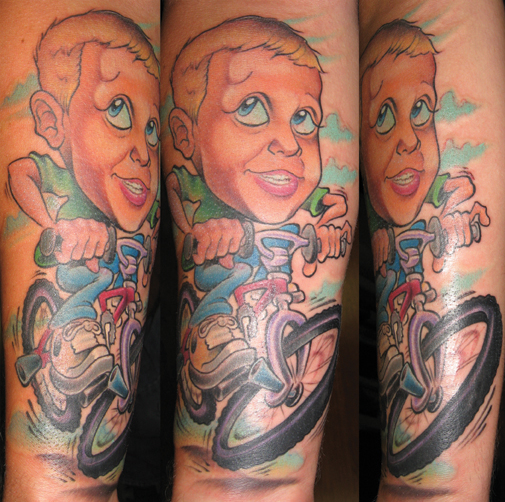 Tattoos - Cartoon tattoos - KID ON A BIKE